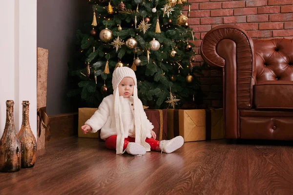 Happy baby smile near the Christmas tree — Stock Photo, Image