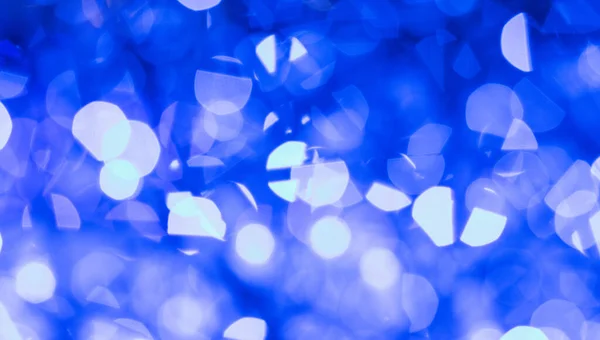 Ünnepi Háttér Kék Fények Egy Karácsonyi Koszorú — Stock Fotó