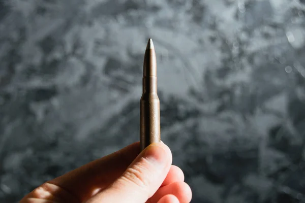 Old Cartridge Hand Gray Background Concept Modern Armaments War Ukraine — Fotografia de Stock