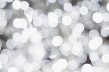 Noel çelengi, beyaz ışıklı şenlikli arka plan.