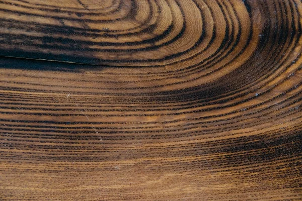 Tasarım işleri ve ev dekorasyonu için eski koyu renkli bir tahtanın ahşap dokusu..