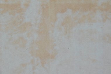 Lekeli eski kağıdın dokusu, kopyalama alanı olan hafif arkaplan.