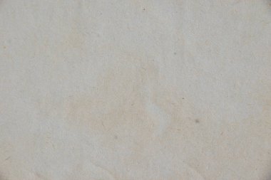 Lekeli eski kağıdın dokusu, kopyalama alanı olan hafif arkaplan.