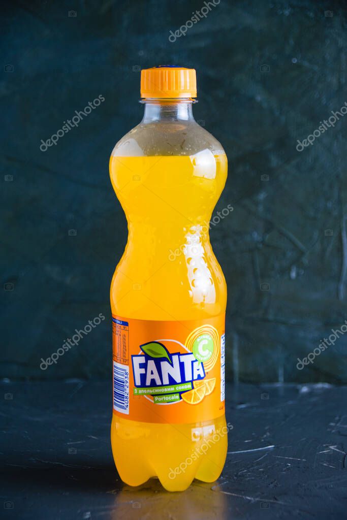 Ukraine, Chernihiv, June 23, 2022: Fanta drink in a branded plastic bottle on a gray background.