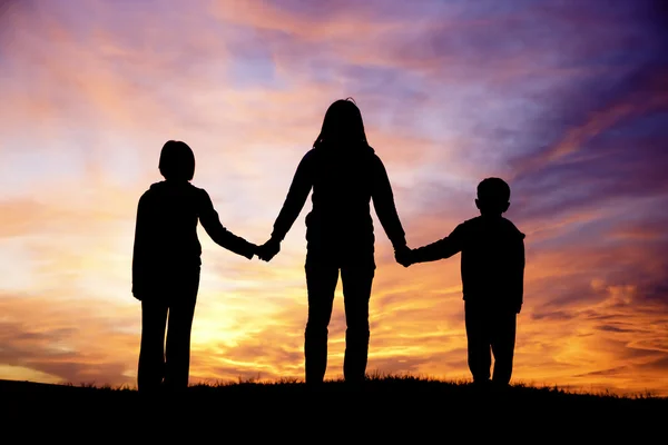 Family watching sunset. — Stock Photo, Image