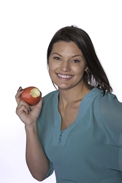 Woman displays apple. — Stock Photo, Image