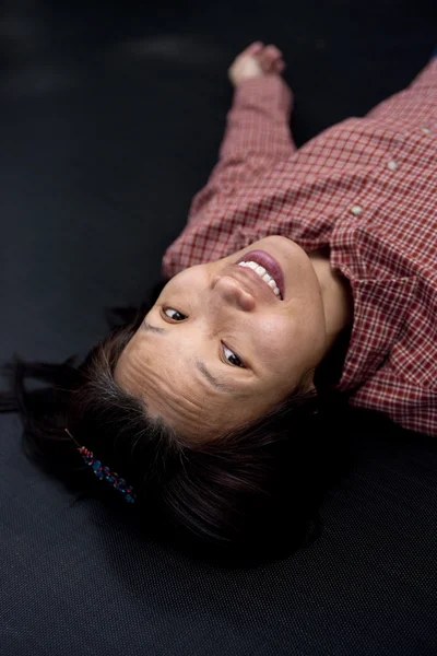 Korean woman laying down. — Stock Photo, Image