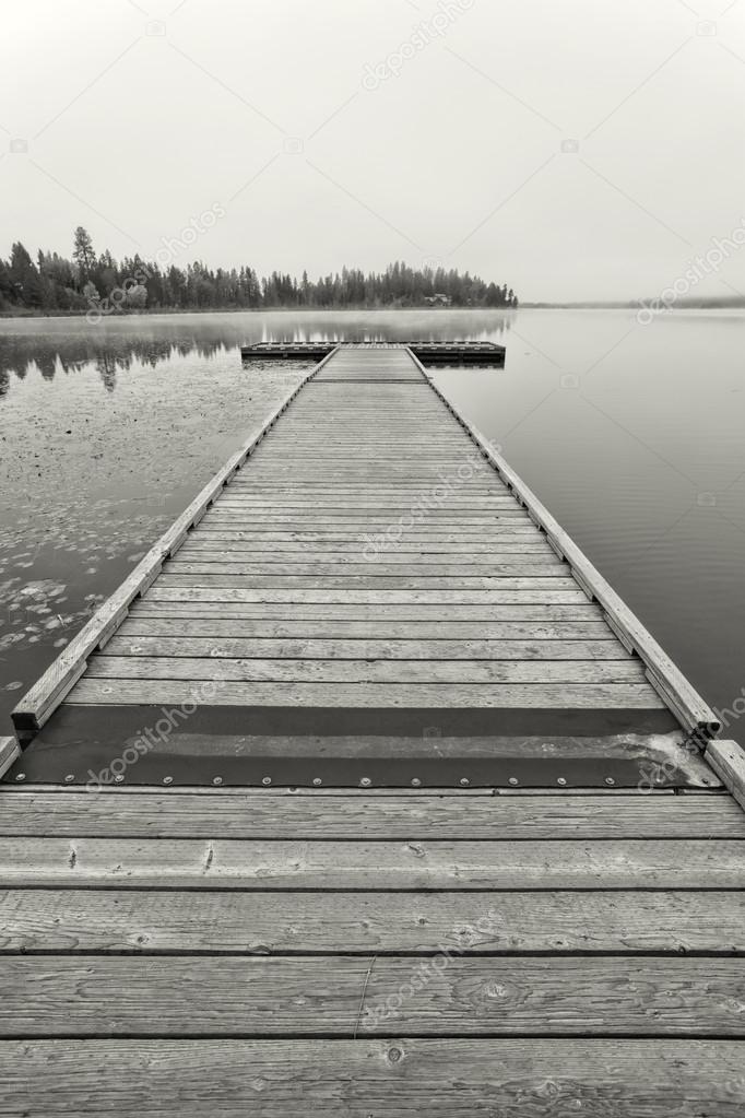 B&W image of a wooden dock.