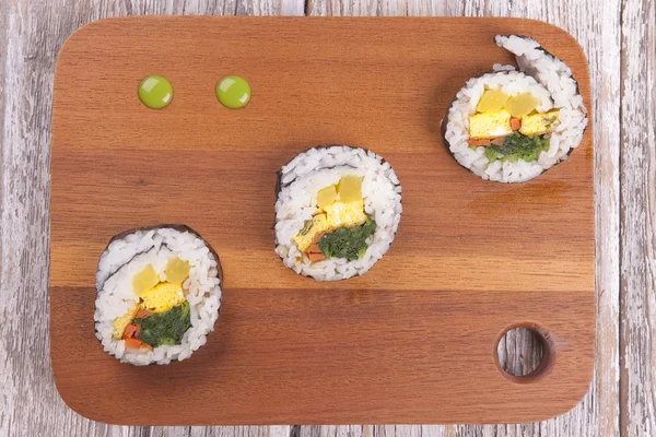 Wasabi drops and sushi. — Stock Photo, Image
