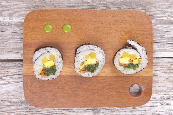 Sushi and wasabi on board. — Stock Photo, Image