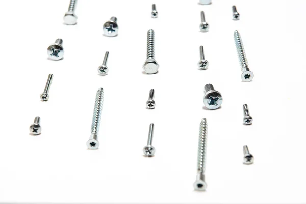 Lot Metal Silver Screws White Background — Stock Photo, Image