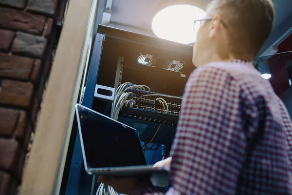 Back View Server Room Technician Engineer Glasses Hold Notebook Adjust — 图库照片