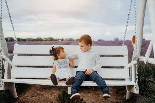 Two Happy Children Lavender Flowers Brother Sister Sitting White Wood — Zdjęcie stockowe