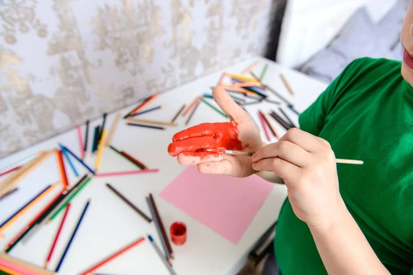 Close Boy Kid How Painting His Hand Red Paint Background — Fotografia de Stock