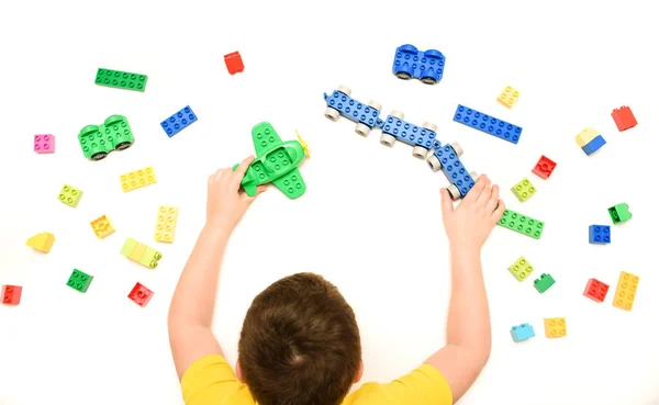 Close Kid Boy Hands Playing Toy Airplane Toy Bricks White — Stock Photo, Image