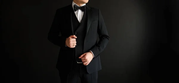Close Man Who Arranging His Black Suit Black Background Copy — Stock Photo, Image