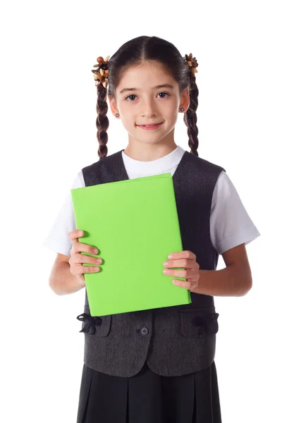 Ragazza sorridente in piedi con libro — Foto Stock