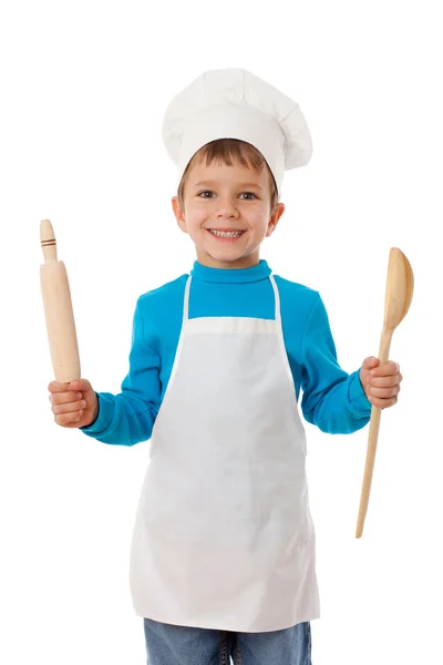Pequeno cozinheiro com concha e rolo — Fotografia de Stock