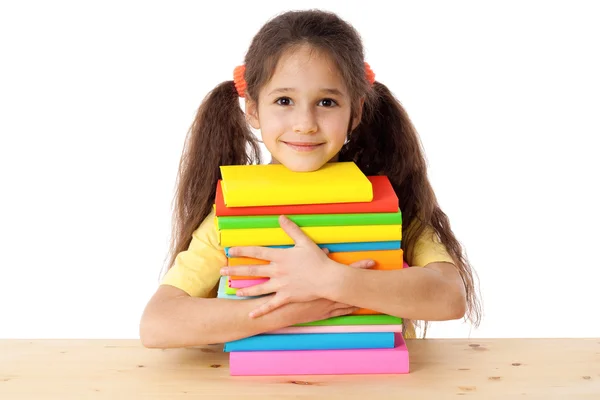 Ragazza con mucchio di libri — Foto Stock