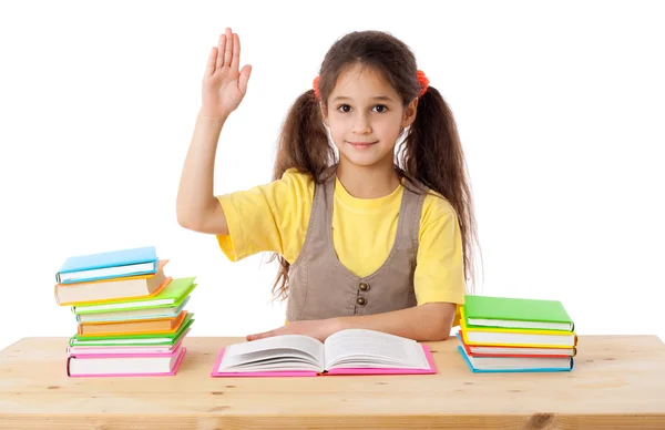 Menina com livros e levanta a mão — Fotografia de Stock