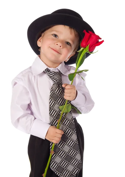 Little boy with red rose — Stock Photo, Image
