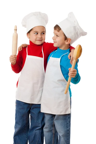 Pequeños cocineros con cucharón y rodillo —  Fotos de Stock