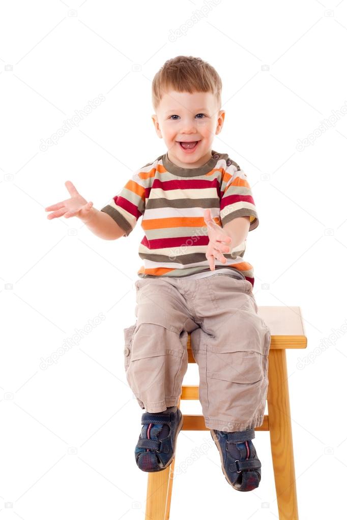 Little boy sitting on stool — Stock Photo © sbworld7 #23328628