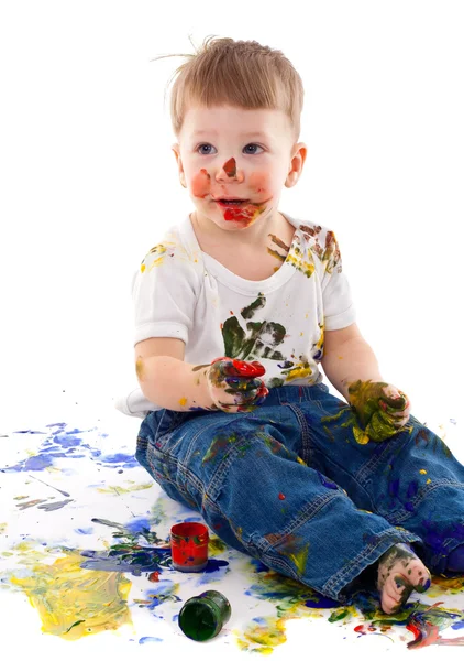 Little boy stained in paint — Stock Photo, Image
