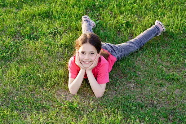 Happy girl on the lawn — Stock Photo, Image