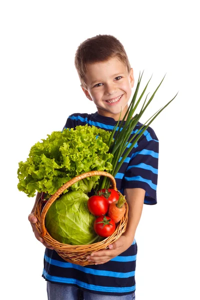 Ragazzo sorridente con verdure — Foto Stock