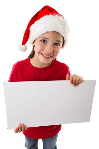 Menina de Natal de pé com vazio em branco — Fotografia de Stock