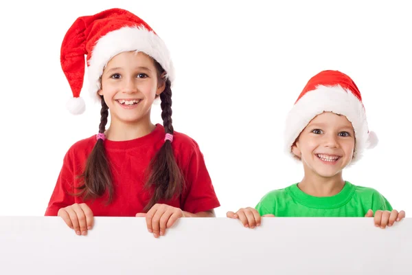 Kids standing with empty banner — Stock Photo, Image