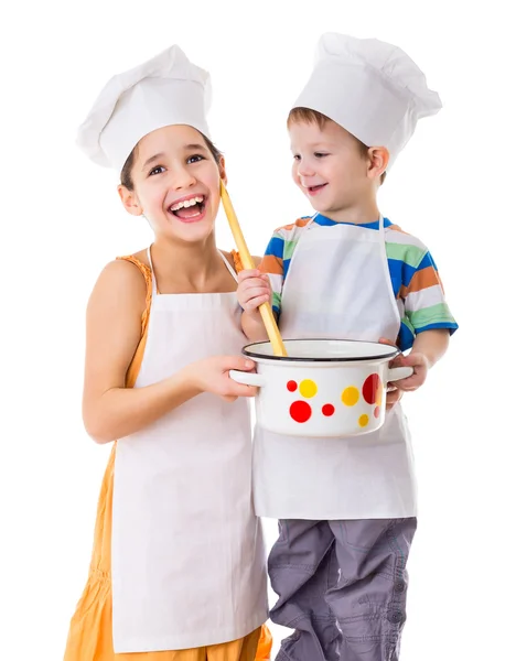 Δύο παιδιά με τηγάνι και μεγάλη κουτάλα — Φωτογραφία Αρχείου