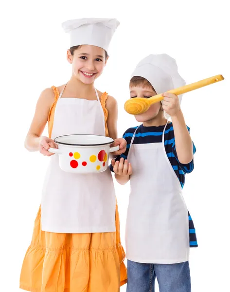 Bambini con padella e mestolo grande — Foto Stock