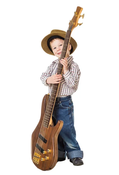 Niño pequeño de pie con guitarra rock — Foto de Stock