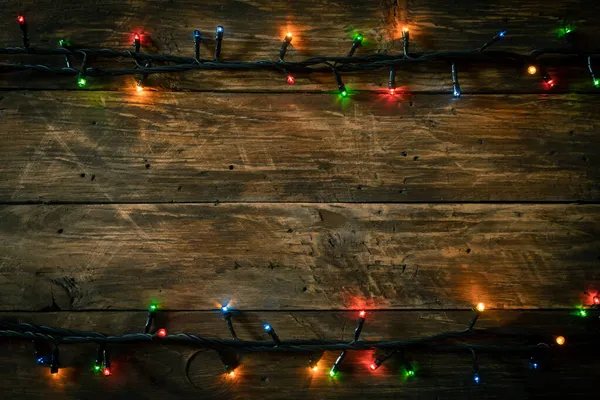 Темный Праздничный Деревянный Фон Электрической Гирляндой Украшение Праздника Лицензионные Стоковые Изображения