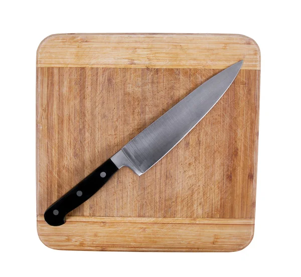 Knife on board — Stock Photo, Image