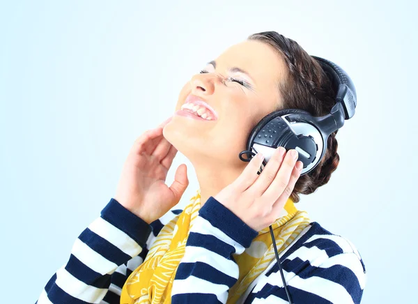 Beautiful girl with headphones. Isolated on a white background — Stock Photo, Image