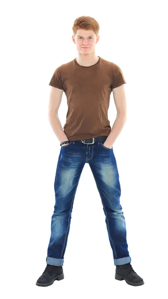 Portret van knappe jonge man in casual kleding permanent over w — Stockfoto