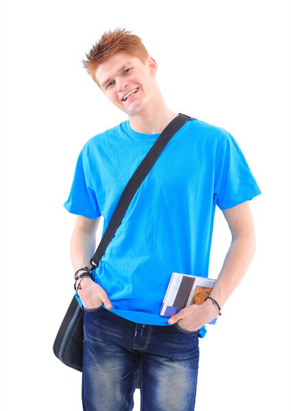 Portrait of handsome young man in casual clothes standing over w