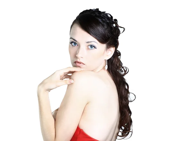 Mooi meisje in de rode jurk. geïsoleerd op een witte achtergrond. — Stockfoto