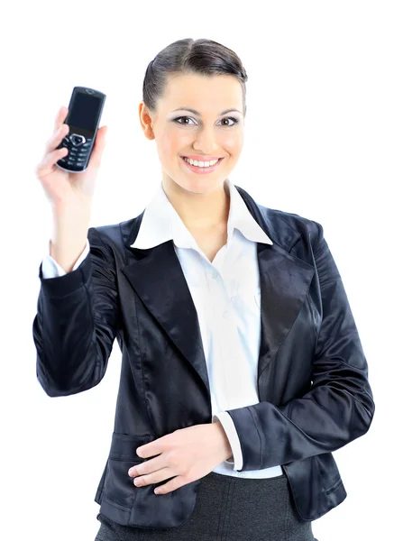 Mooie zakenvrouw verwijst naar de telefoon. geïsoleerd op een witte achtergrond. — Stockfoto