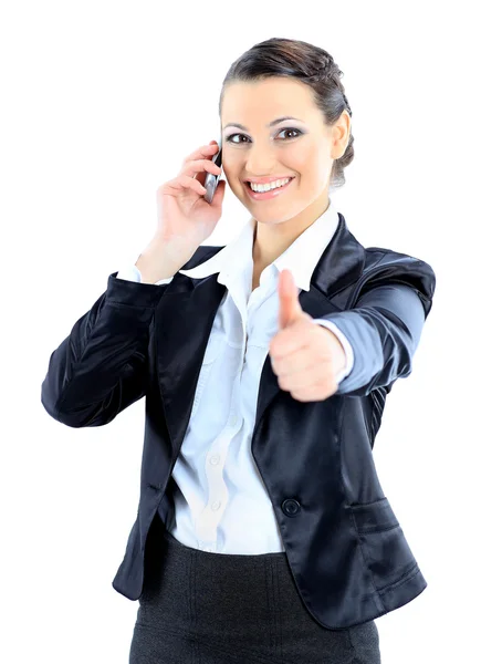 Beautiful business woman talks on the phone. Isolated on a white background. Royalty Free Stock Images