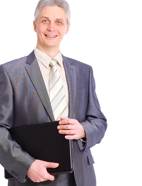 Hombre con portátil sobre un fondo blanco — Foto de Stock