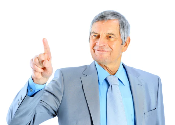Buen hombre de negocios a la edad, señala con el dedo. Aislado sobre un fondo blanco . —  Fotos de Stock