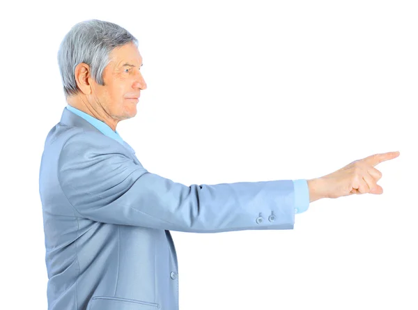 Nice businessman at the age, point the finger. Isolated on a white background. Stock Picture