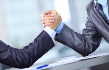 Two businessmen press hands each other on a forward background clipart
