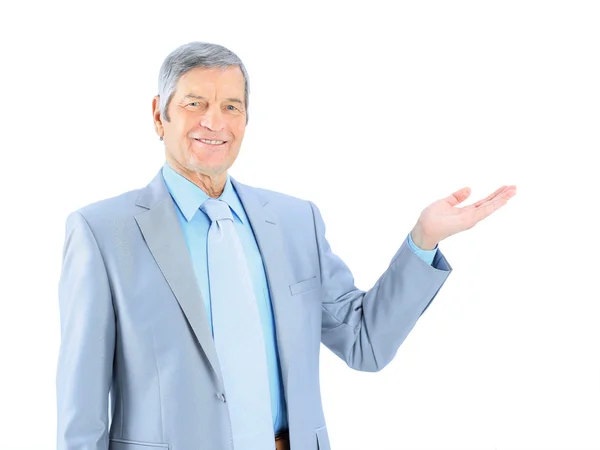 Businessman in age, with an outstretched hand. Isolated on a white background. — Stock Photo, Image