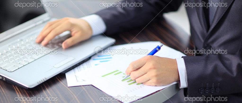 Businessman working with documents in the office