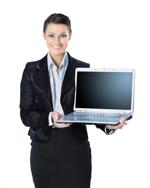 Дратівлива жінка з ноутбуком в руках посміхається, ізольована на білому тлі . — стокове фото